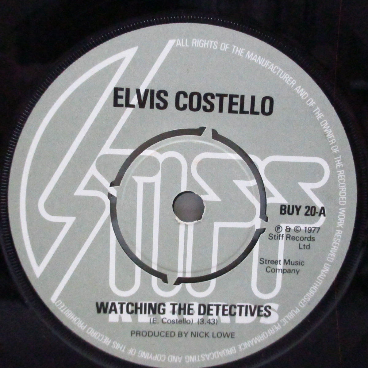 ELVIS COSTELLO (エルヴィス・コステロ) - Watching The Detectives (UK オリジナル「ラウンドセンター」7"+カンパニースリーブ)Stiffからのラストシングル!
