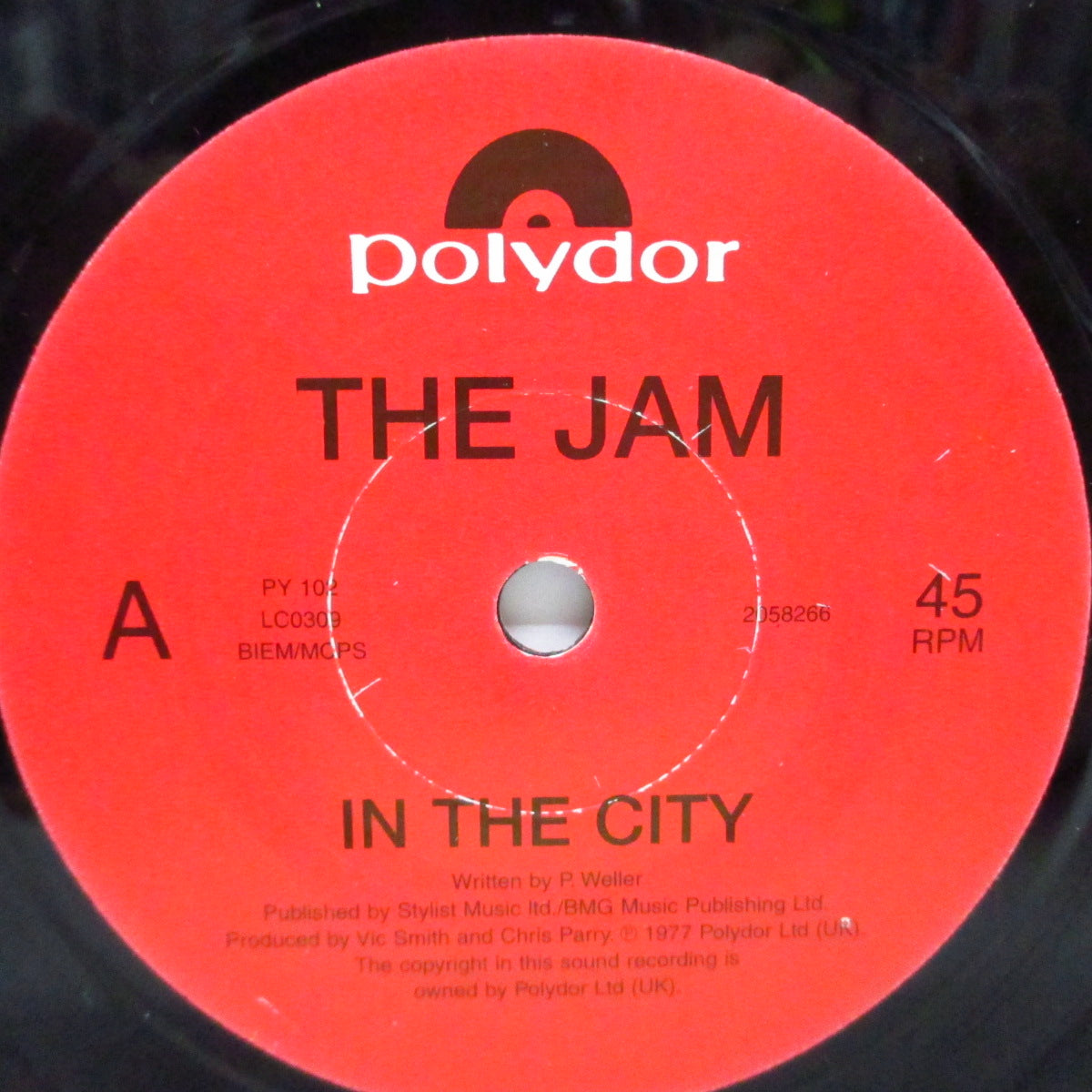 JAM, THE (ザ・ジャム) - In The City (UK '97 プロモ片面 7"+ダイカット赤ジャケ)