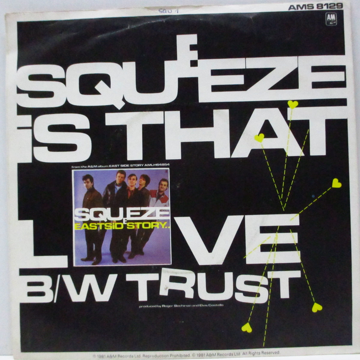 SQUEEZE (スクイーズ) - Is That Love (UK オリジナル「フラットセンター」7"/光沢ソフト紙ジャケ) B面アルバム未収録!