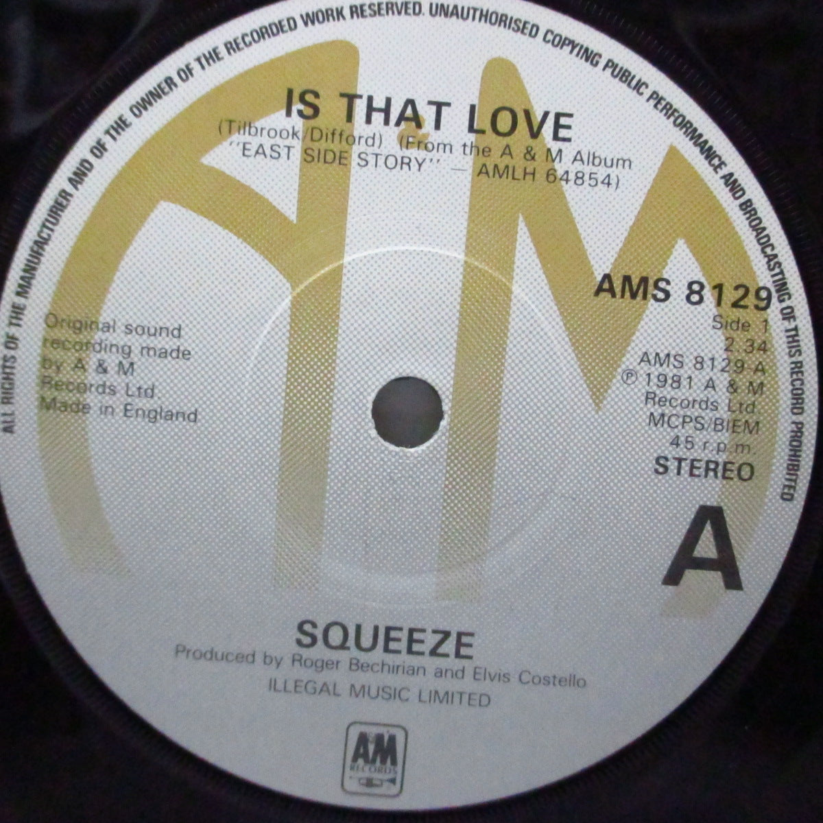SQUEEZE (スクイーズ) - Is That Love (UK オリジナル「フラットセンター」7"/光沢ソフト紙ジャケ) B面アルバム未収録!