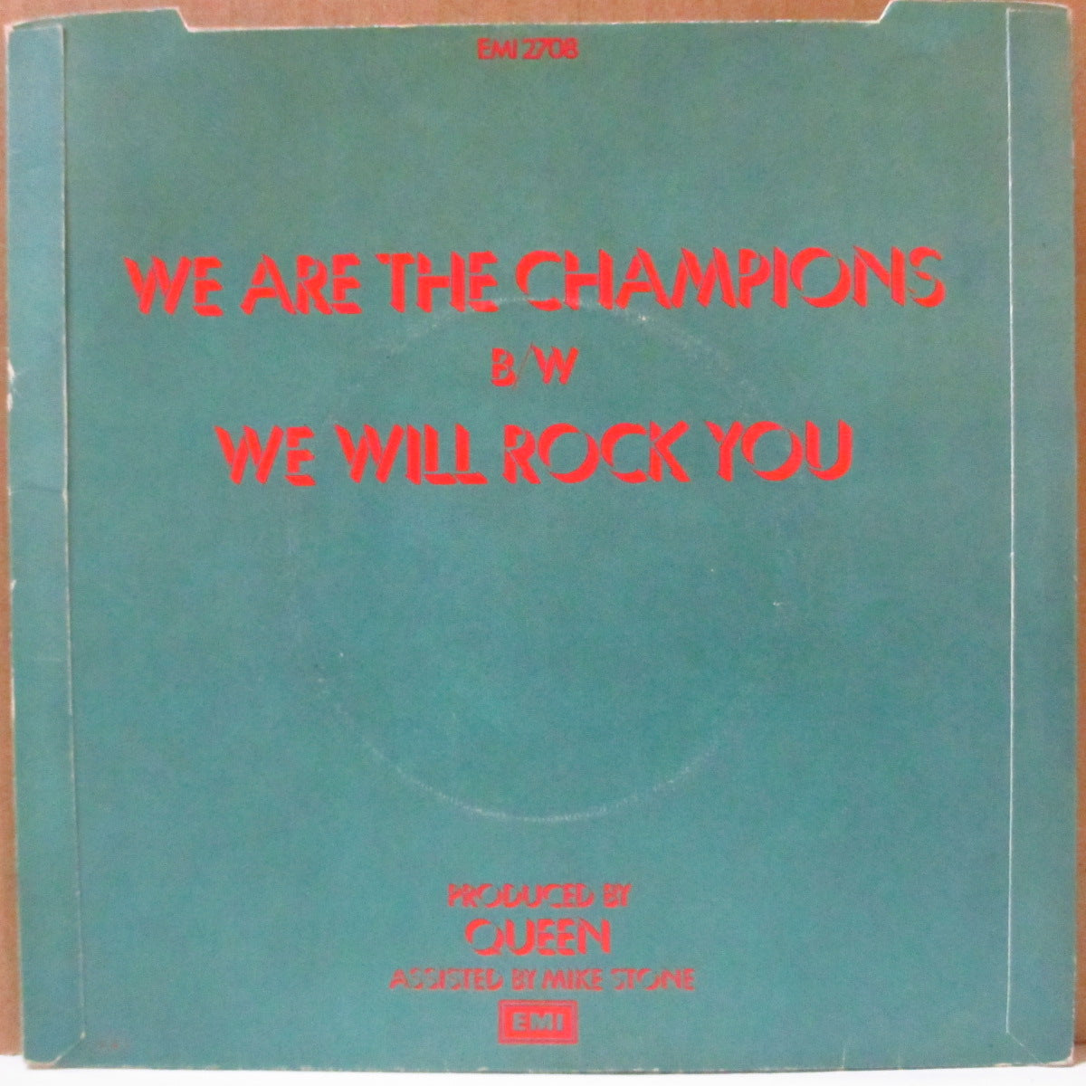 QUEEN (クイーン) - We Are The Champions (UK '77 オリジナル「カラー紙ラベ・ラウンドセンター」 7インチ+光沢固紙ジャケ)
