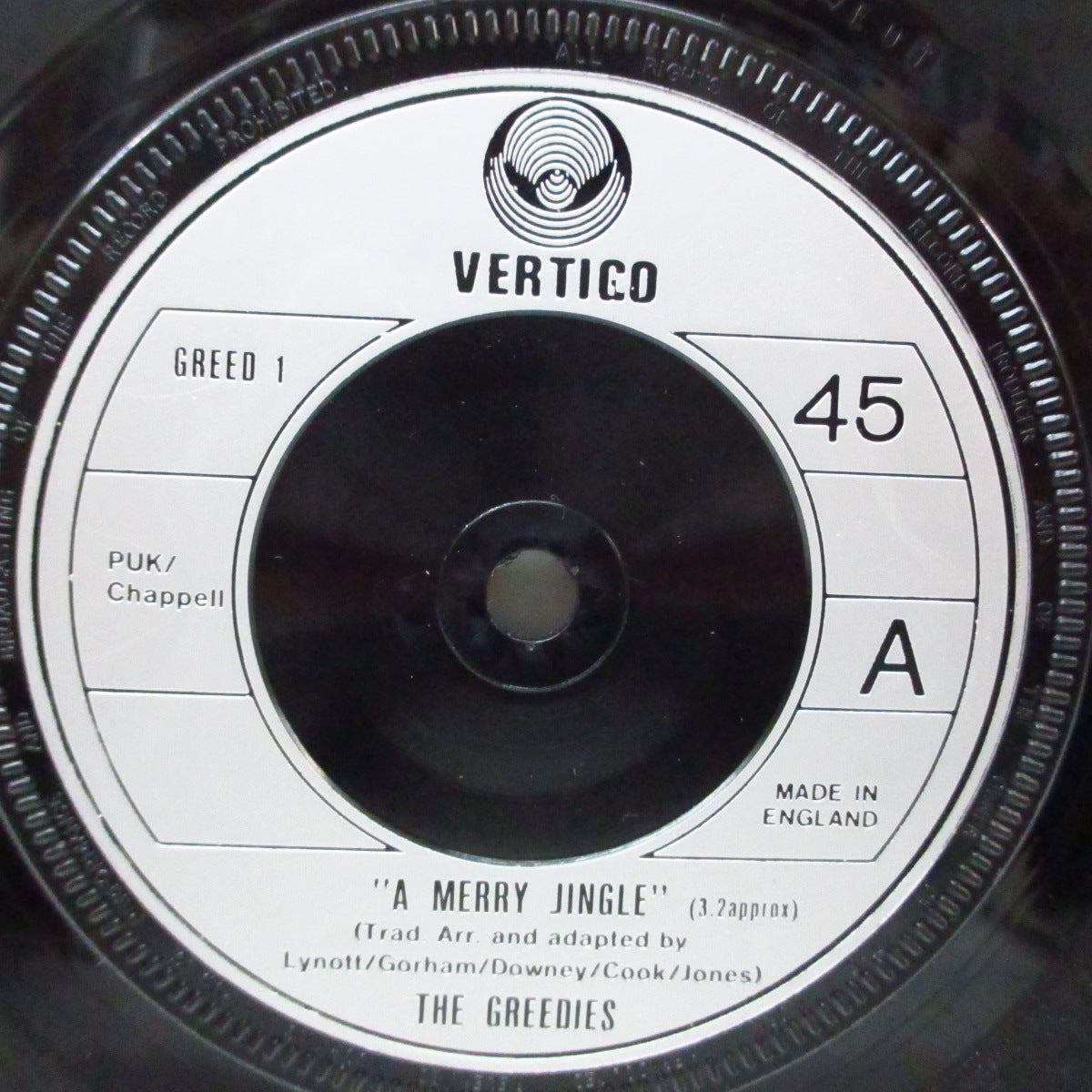GREEDIES, THE (ザ・グリーディーズ) - A Merry Jingle (UK オリジナル「フラットセンター」7"/光沢ソフト紙折り返しジャケ) メンバー写真の周りに白枠が無い Ver!
