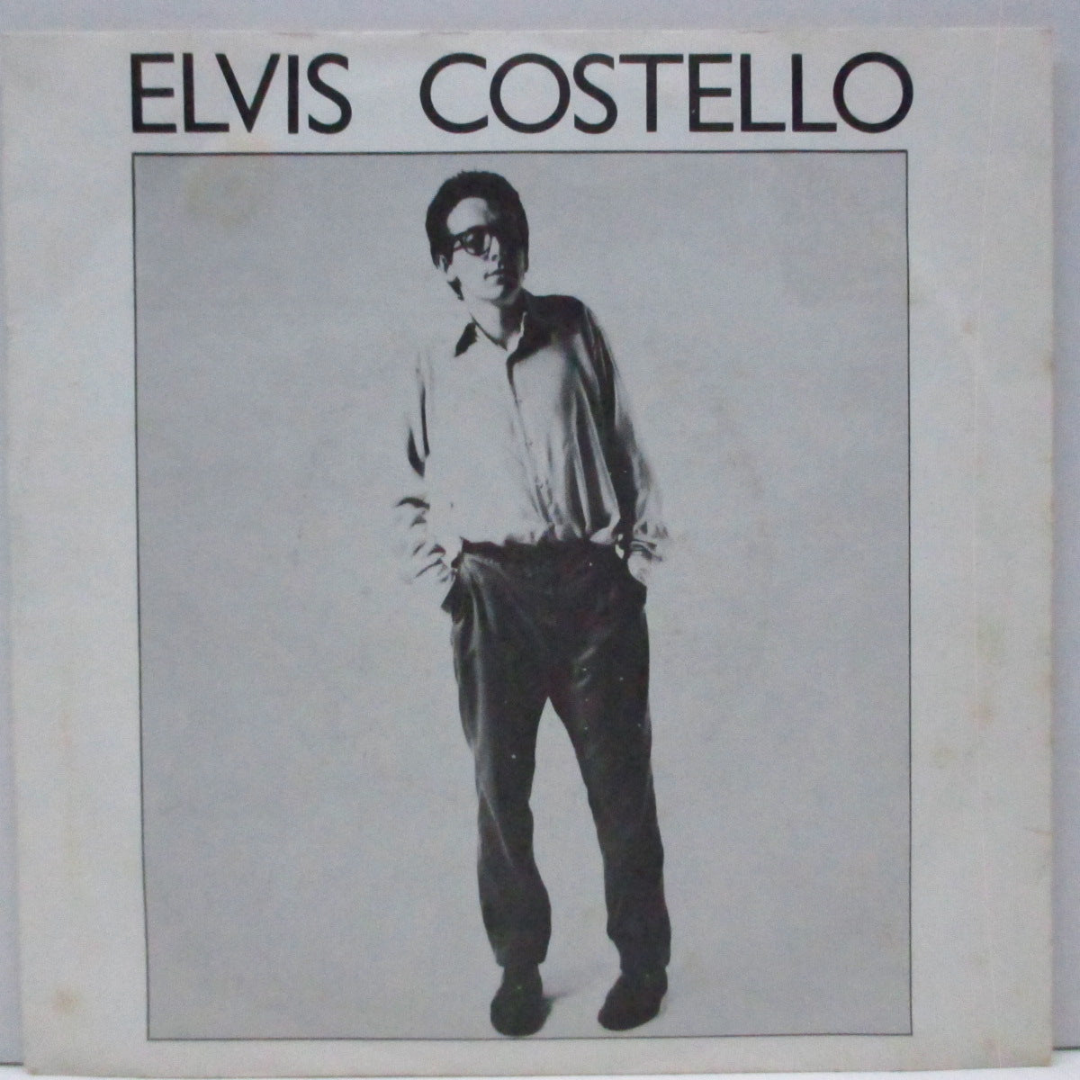ELVIS COSTELLO (エルヴィス・コステロ) - Less Than Zero (UK '81 再発 7"/マットソフト紙折り返ジャケ) 「Stiff Singles Four Pack (GRAB 3)」からのバラ売りバージョン !