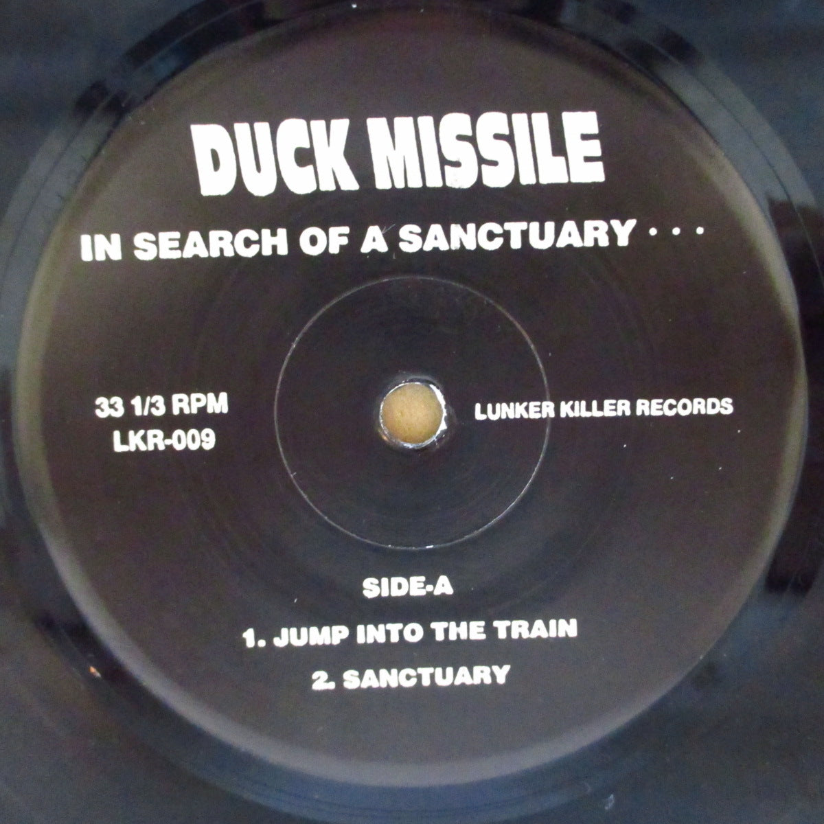 DUCK MISSILE (ダック・ミサイル) - In Search Of A Sanctuary (Japan '97 オリジナル4曲入り33回転 7インチ+インサート/光沢固紙ジャケ, プリント入りPVC)