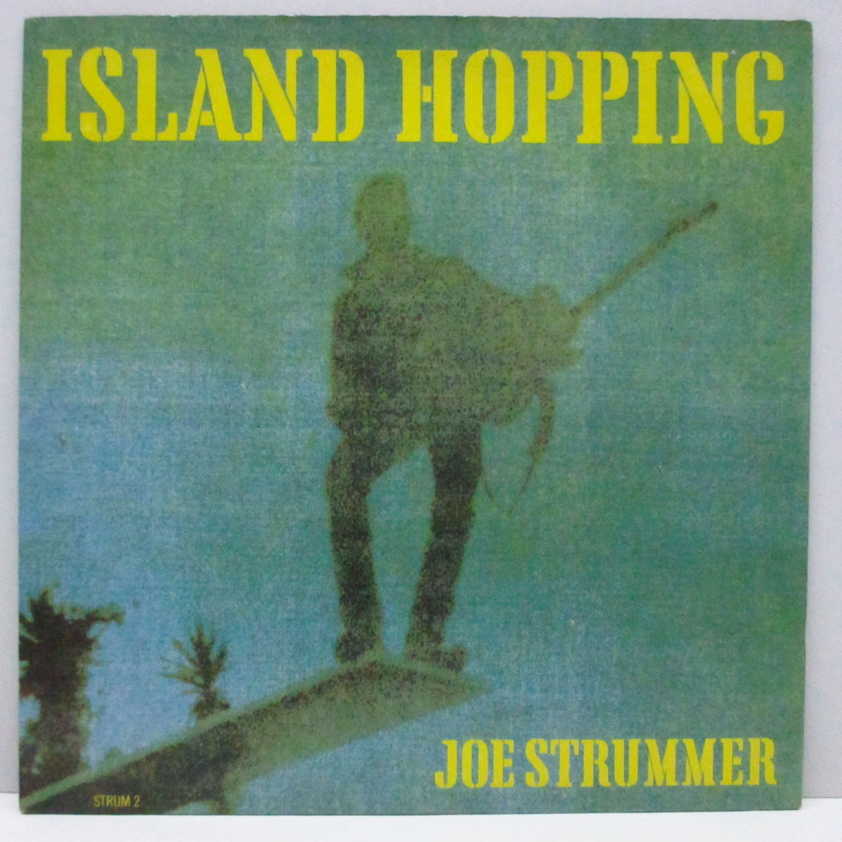 JOE STRUMMER (ジョー・ストラマー) - Island Hopping (UK オリジナル 7"+光沢固紙ジャケ)
