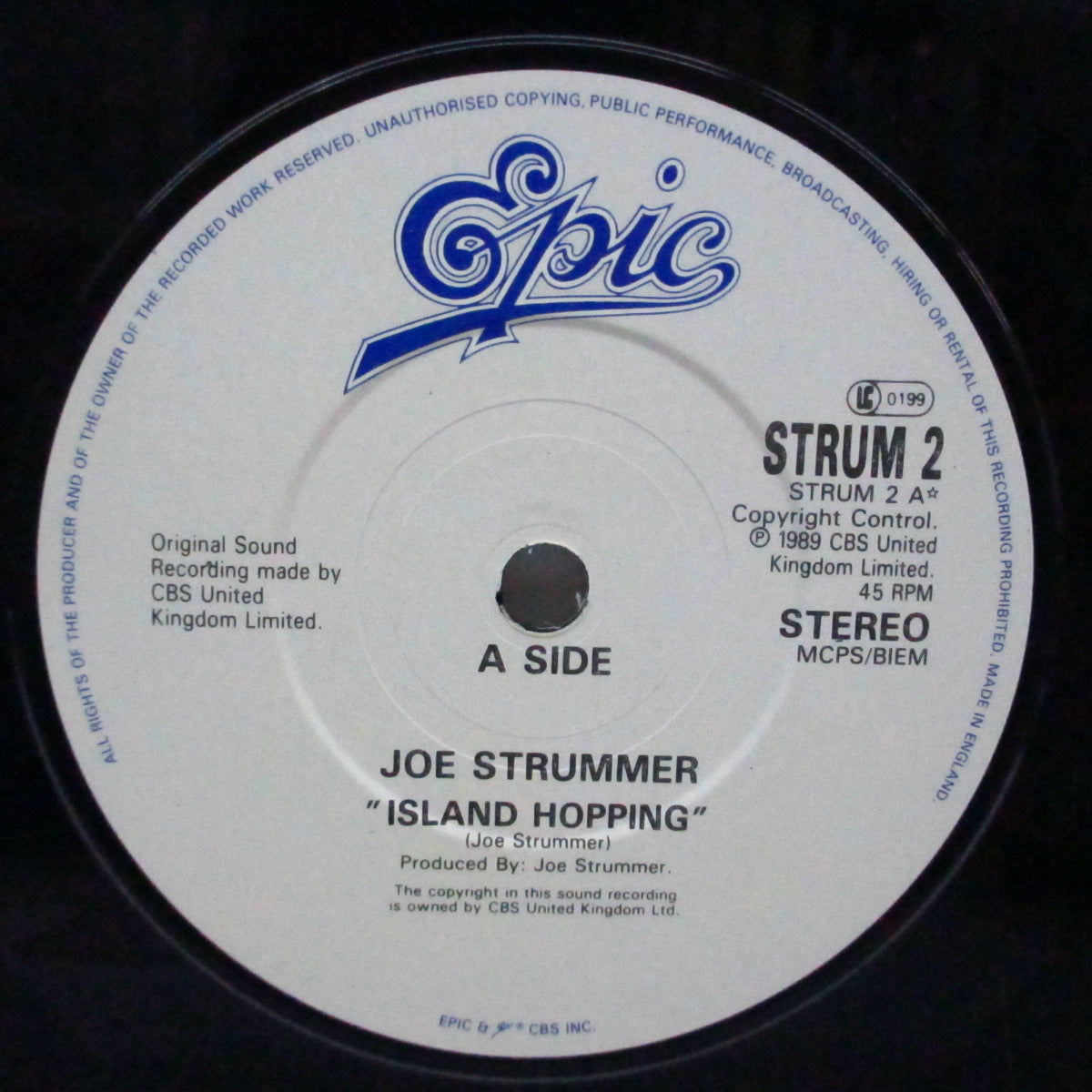 JOE STRUMMER (ジョー・ストラマー) - Island Hopping (UK オリジナル 7"+光沢固紙ジャケ)
