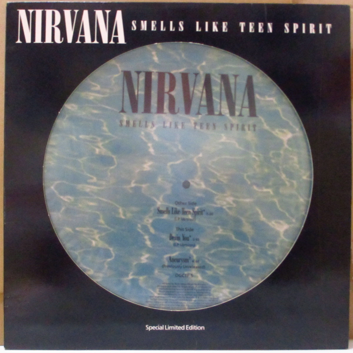 NIRVANA (ニルヴァーナ) - Smells Like Teen Spirit +2 (UK 限定ピクチャー  12インチ+PVC/UKツアー日程記載片面ダイカット光沢ジャケ)