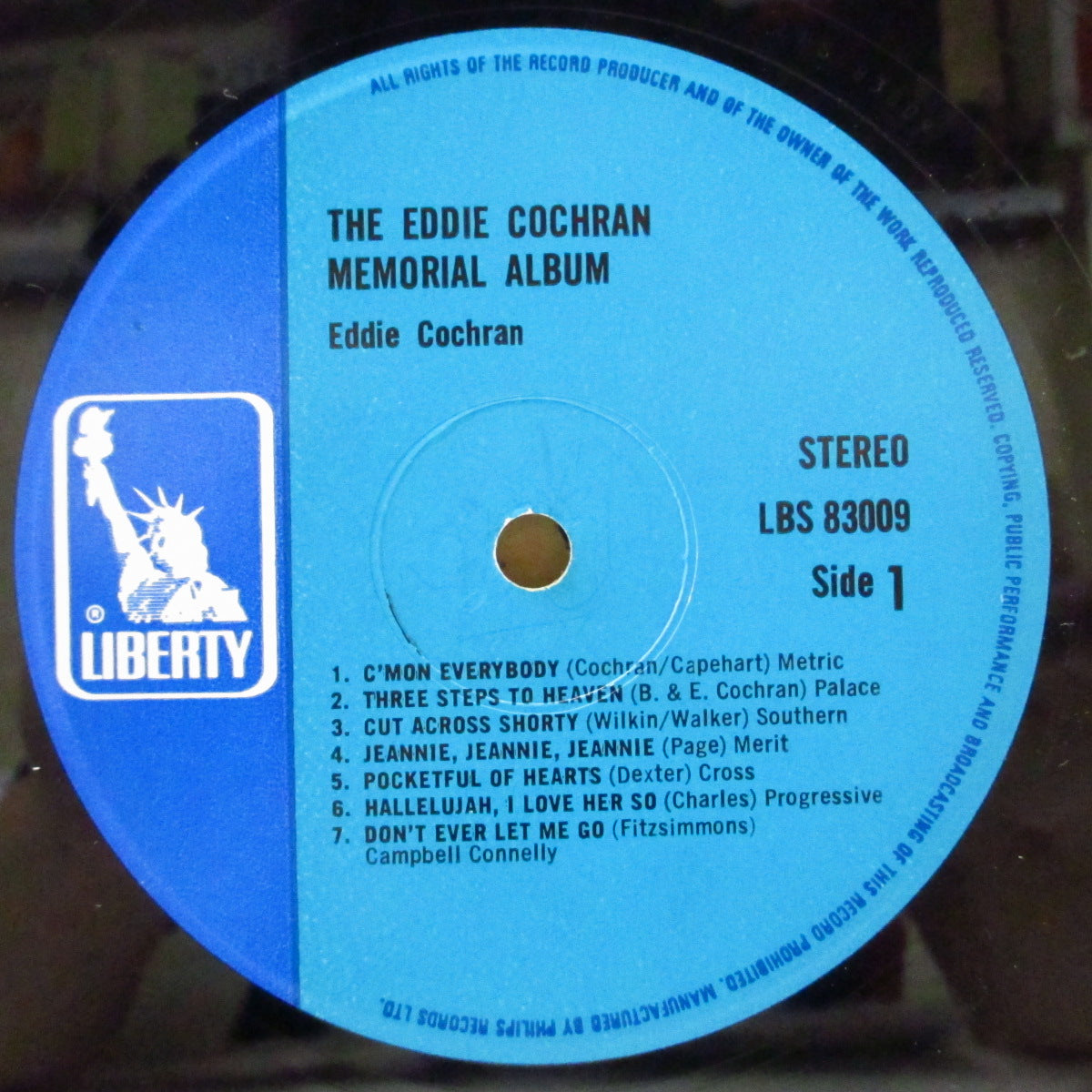 EDDIE COCHRAN (エディ・コクラン) - The Eddie Cochran Memorial Album (UK '70 再発「ブルー&スカイブルー・ラベ ver」(擬似)ステレオLP /表面コーティングジャケ) 追悼企画ベスト・アルバム第1弾。