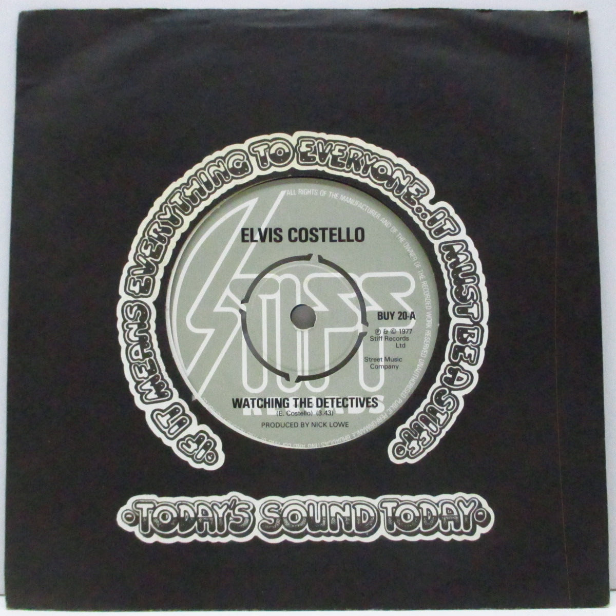 ELVIS COSTELLO  (エルヴィス・コステロ)  - Watching The Detectives (UK オリジナル「ラウンドセンター」7"+カンパニースリーブ）Stiffからのラストシングル！