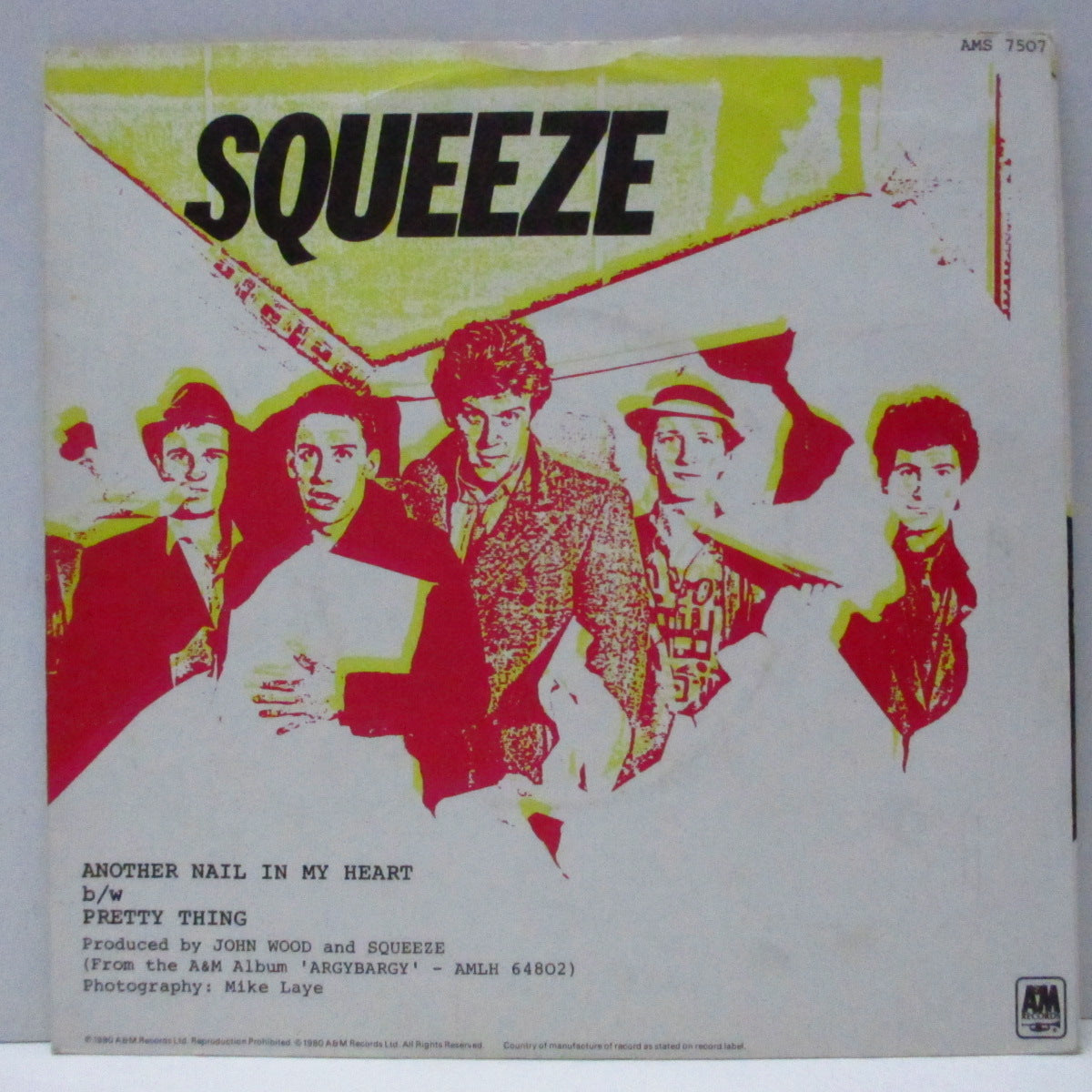 SQUEEZE (スクイーズ)  - Another Nail in My Heart (UK 限定「フラットセンター」クリアヴァイナル 7"/マットソフト紙ジャケ)