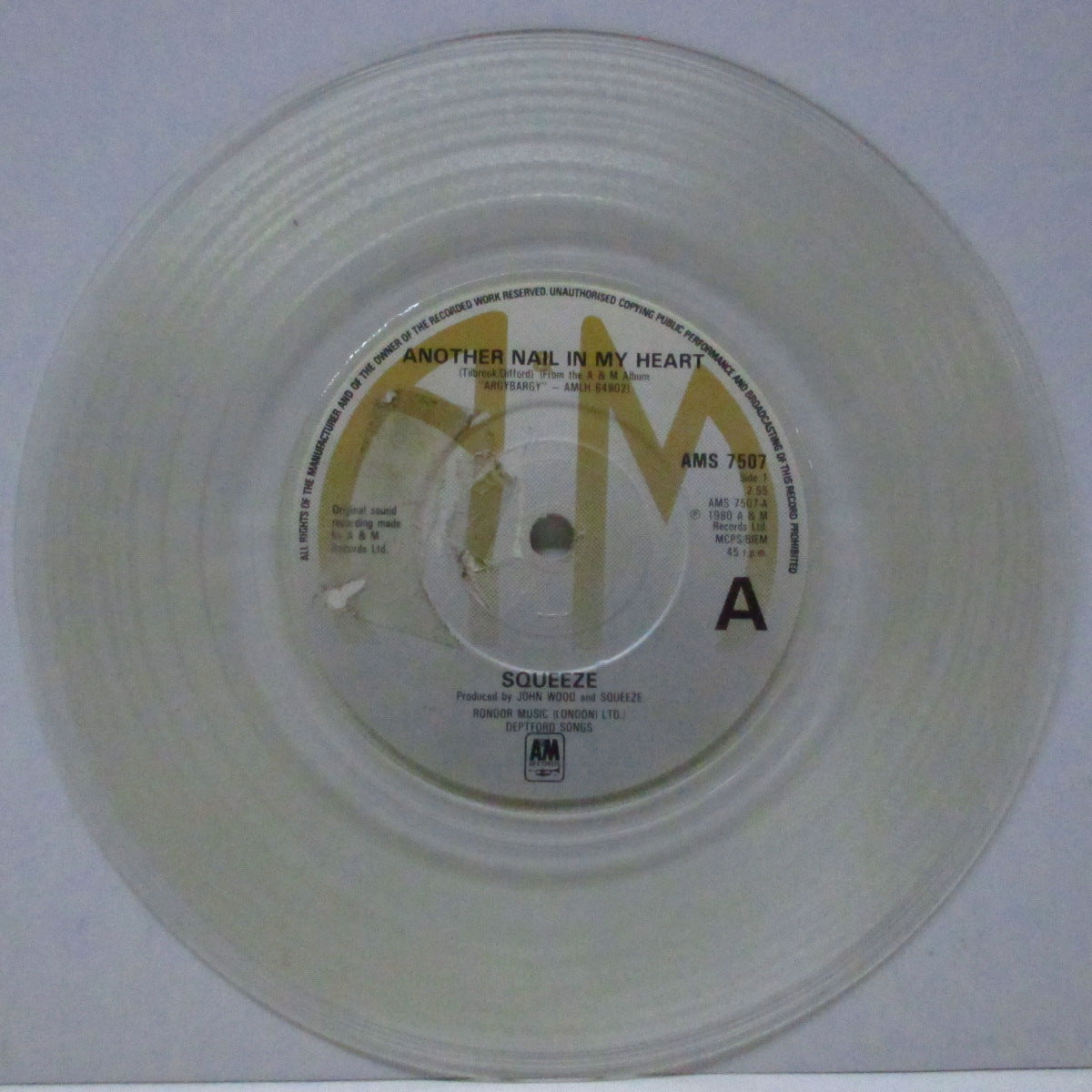 SQUEEZE (スクイーズ)  - Another Nail in My Heart (UK 限定「フラットセンター」クリアヴァイナル 7"/マットソフト紙ジャケ)