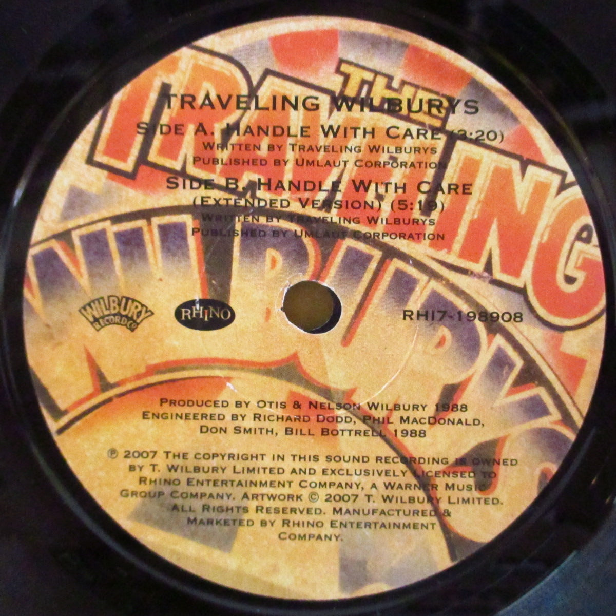 TRAVELING WILBURYS (トラヴェリング・ウィルベリーズ)  - Handle With Care (UK '07 限定2,500枚リマスター再発 7インチ+ざら紙ダイカットジャケ)