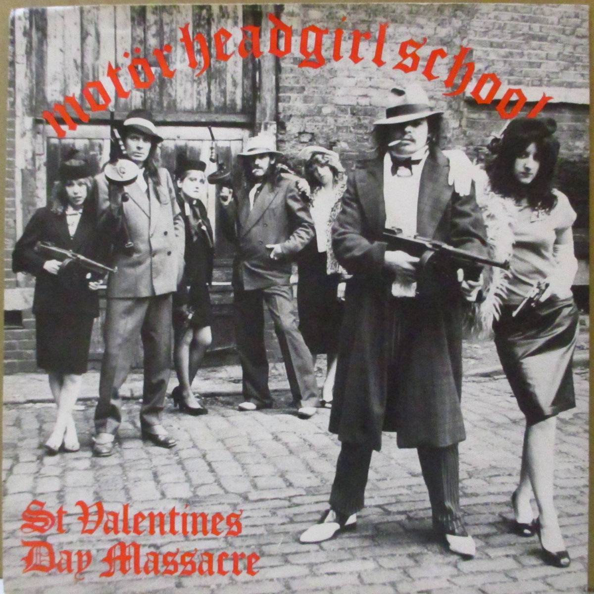 MOTORHEAD / GIRLSCHOOL (モーターヘッド / ガールスクール)  - St.Valentines Day Massacre (UK '81 オリジナル「バンドロゴなし・リム部にギザギザの緑プラスチックラベ」 3曲入り7インチ+ソフト紙ジャケ)