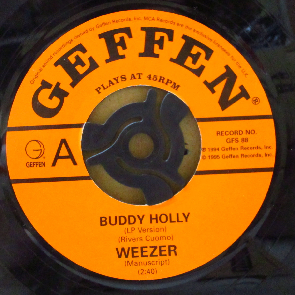 WEEZER (ウィーザー)  - Buddy Holly (UK オリジナル・ラージホールセンター 7"+ざら紙ダイカットジャケ)