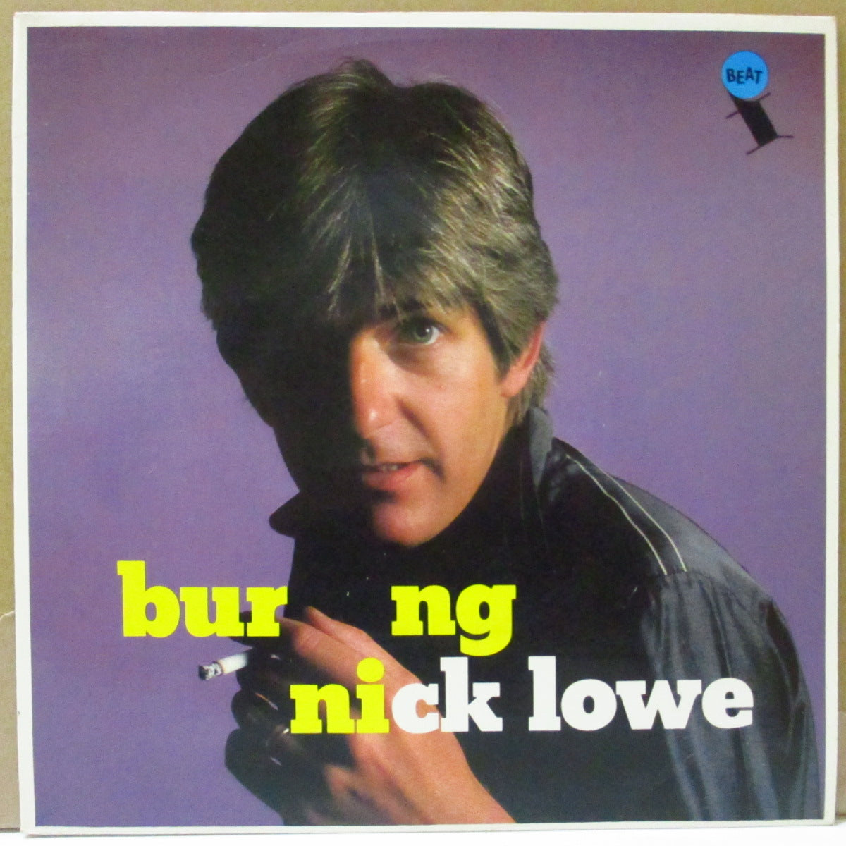 NICK LOWE (ニック・ロウ)  - Burning / Zulu Kiss (UK オリジナル 7"/光沢固紙ジャケ)